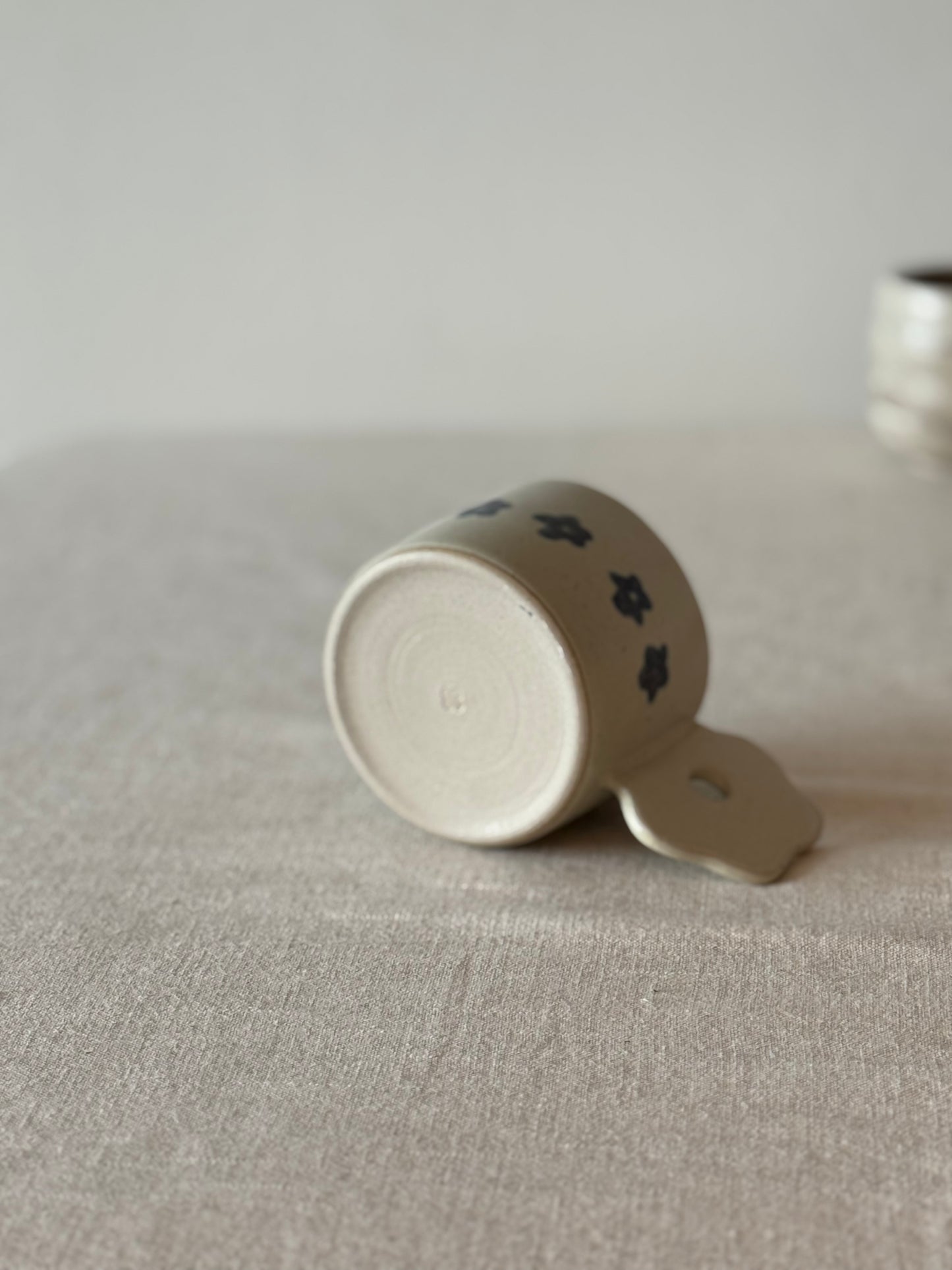 Mug with a flower handle