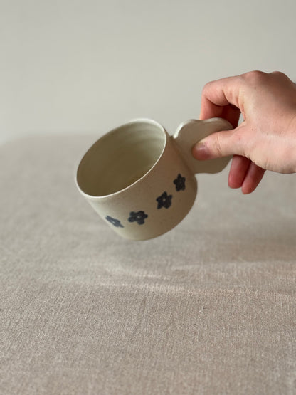 Mug with a flower handle